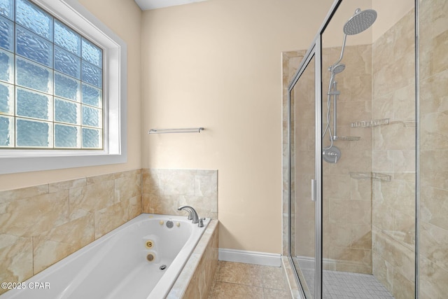 bathroom with plenty of natural light, tile patterned floors, and independent shower and bath