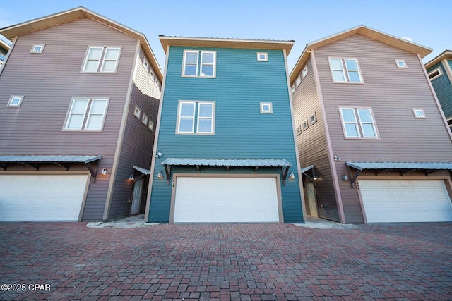 view of property featuring a garage