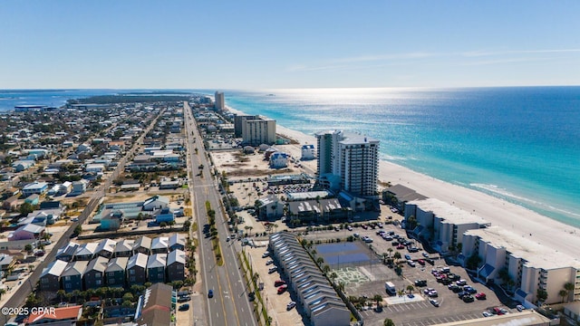 birds eye view of property featuring a water view and a view of the beach