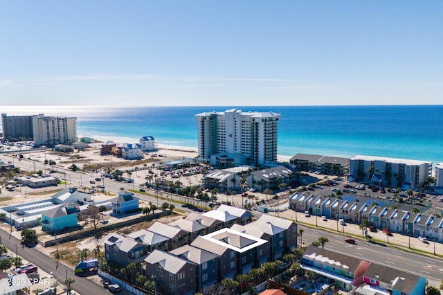 aerial view featuring a water view and a beach view