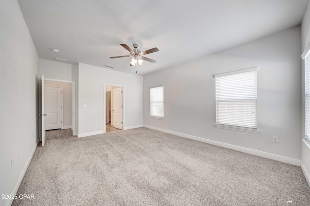 unfurnished bedroom with light carpet and ceiling fan