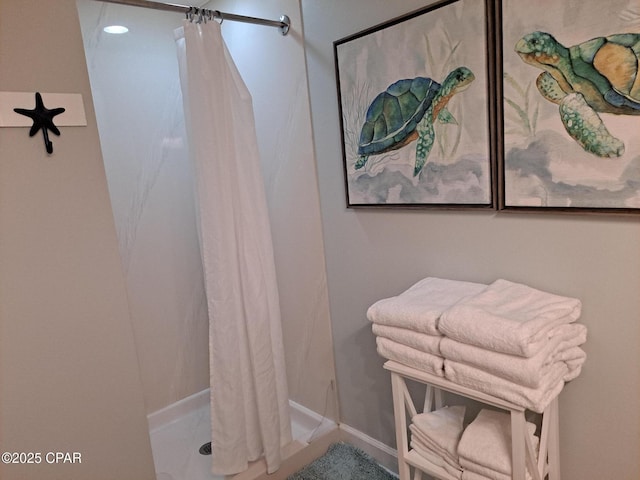 bathroom featuring curtained shower