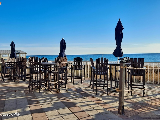 view of patio featuring a water view