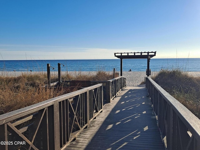 surrounding community featuring a water view