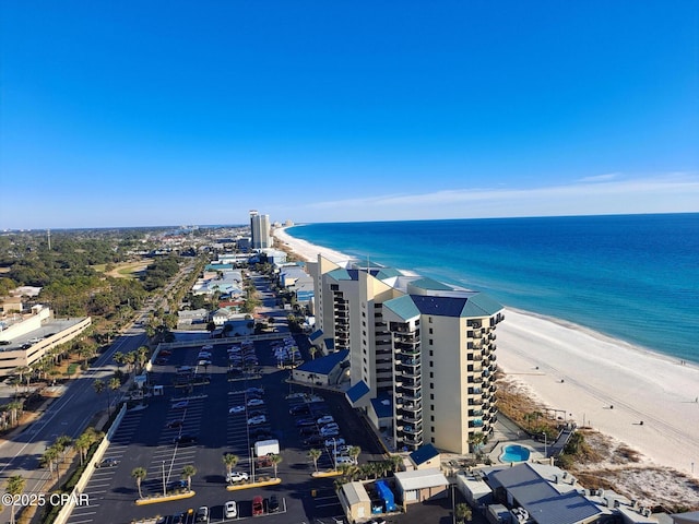 bird's eye view featuring a beach view and a water view