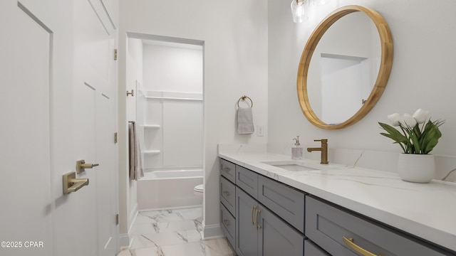 full bathroom with vanity, tub / shower combination, and toilet