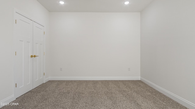 view of carpeted spare room