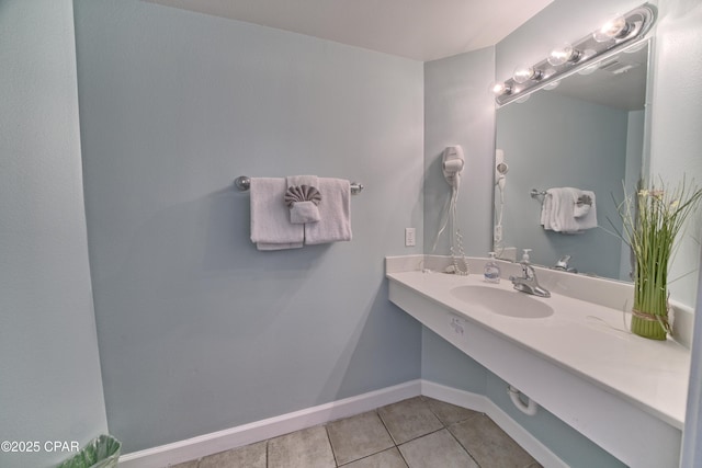 bathroom featuring tile patterned floors and sink