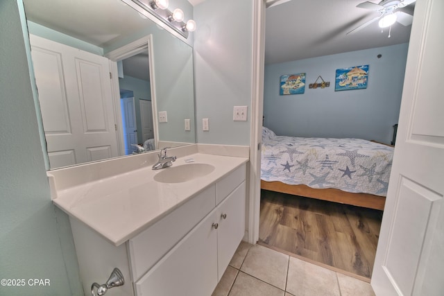 bathroom with vanity, tile patterned floors, and ceiling fan