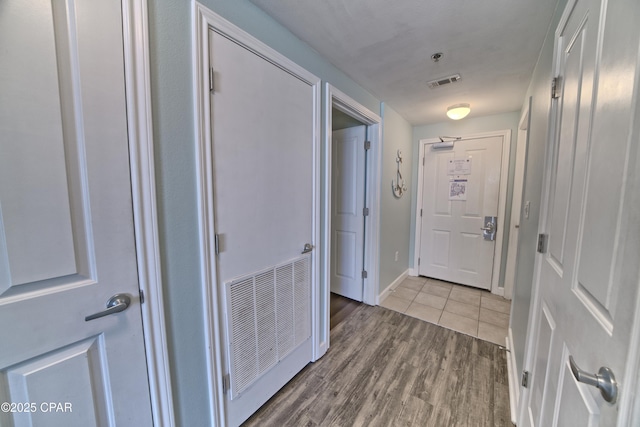 doorway to outside with light hardwood / wood-style flooring