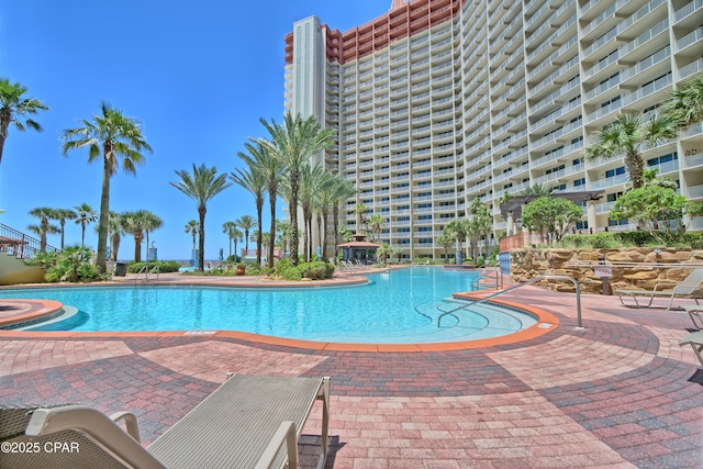 9900 S Thomas Dr Unit 1323, Panama City Beach, FL 32408 - community pool with a patio