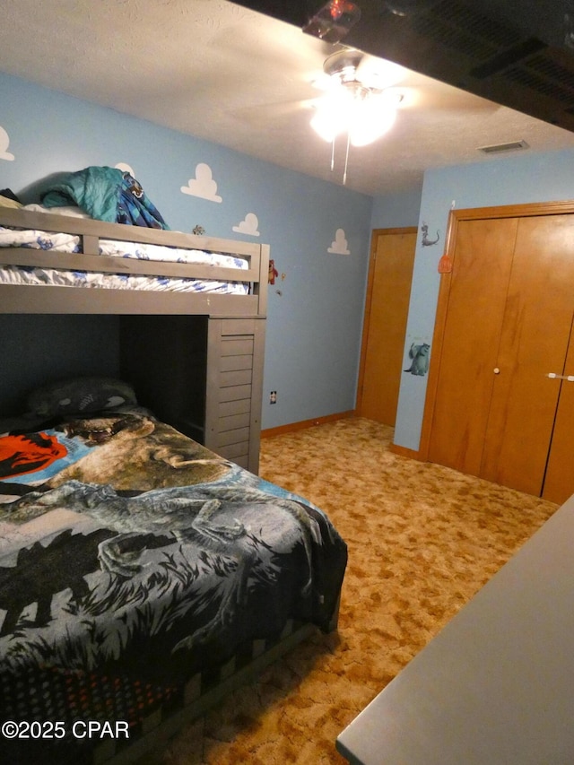 bedroom with carpet flooring and ceiling fan