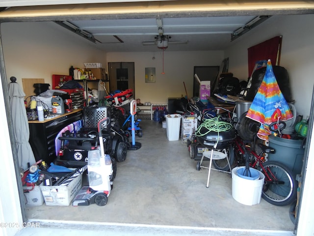 garage featuring a garage door opener