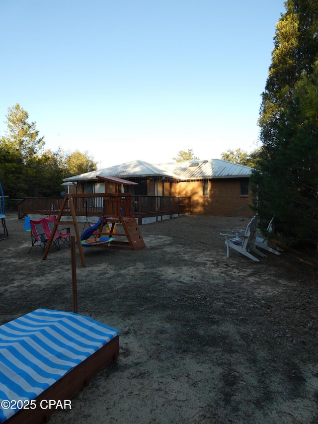 view of yard featuring a playground