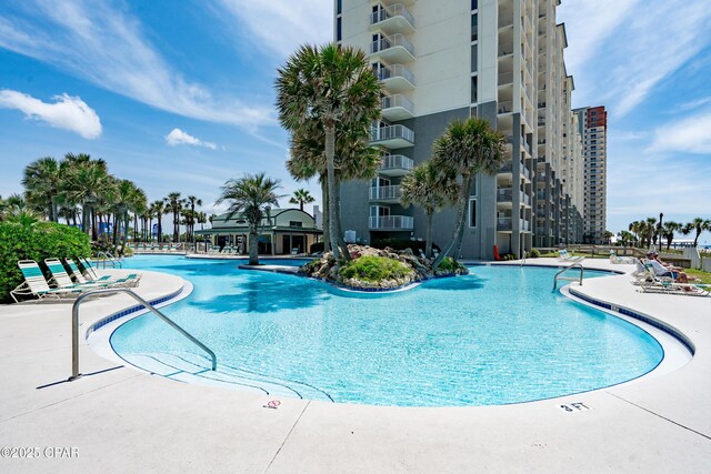 view of pool featuring a patio