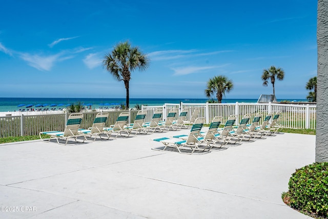 view of patio with a water view