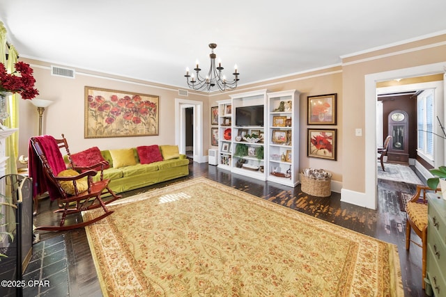 interior space featuring crown molding, dark hardwood / wood-style floors, and an inviting chandelier