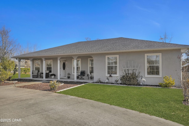 view of front of house with a front lawn and a porch