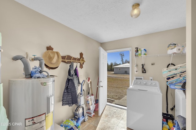 laundry room featuring water heater, light tile patterned floors, a textured ceiling, and washer and clothes dryer