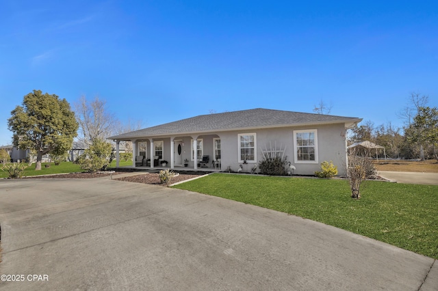 single story home featuring a front yard and covered porch