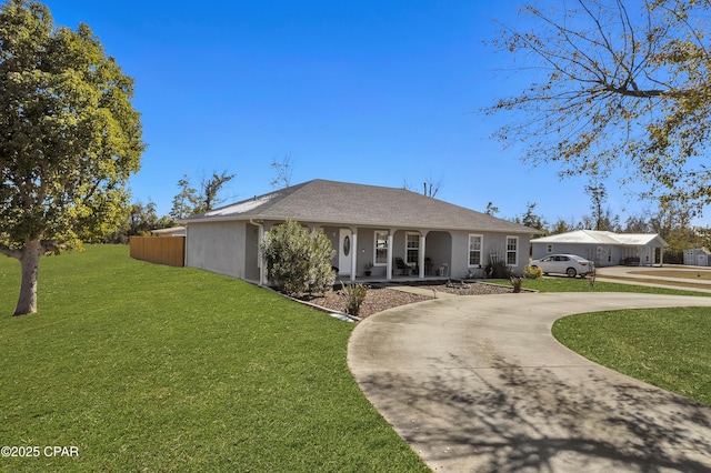 single story home featuring a porch and a front lawn