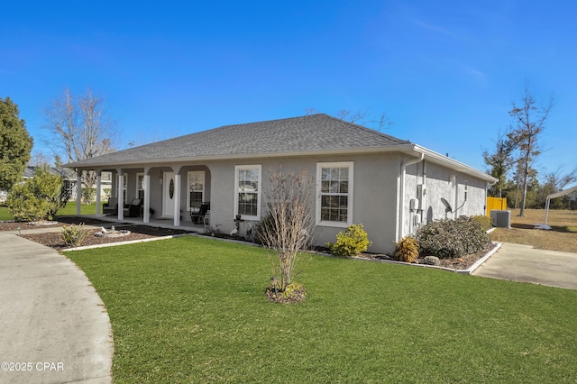 view of front of home featuring a porch, central air condition unit, and a front lawn