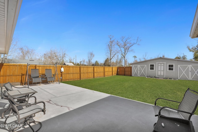 view of patio / terrace with an outbuilding