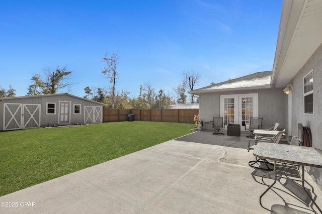 view of patio featuring an outbuilding