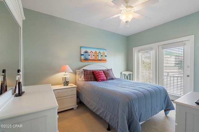 bedroom with access to outside, light carpet, and ceiling fan