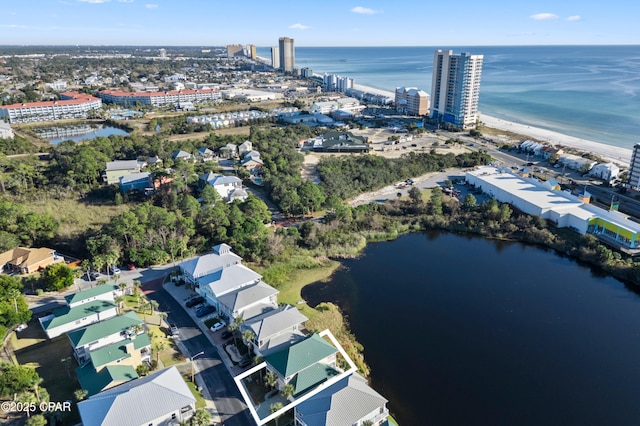 drone / aerial view with a water view