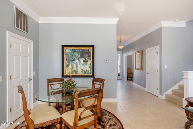 tiled dining space with ornamental molding