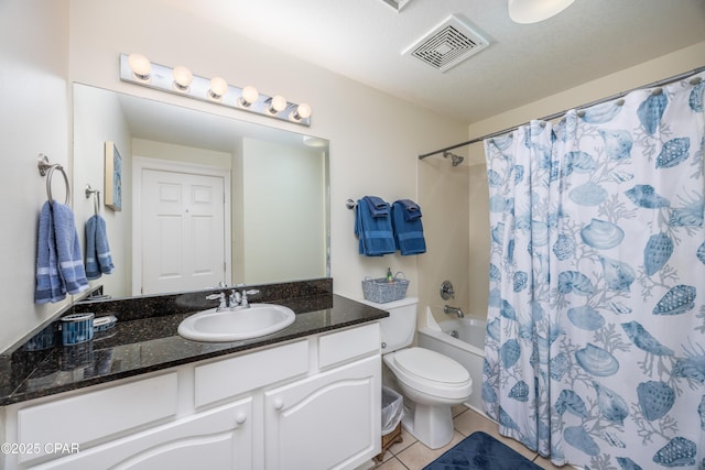 full bathroom featuring tile patterned flooring, vanity, shower / tub combo with curtain, and toilet