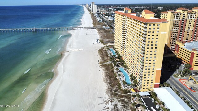 aerial view with a view of the beach and a water view