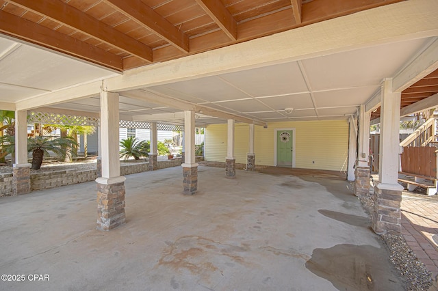 view of patio / terrace featuring a carport