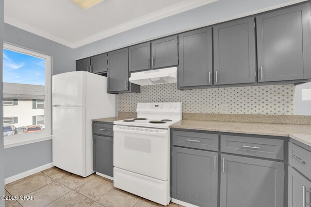 kitchen with sink, white appliances, crown molding, gray cabinetry, and decorative backsplash