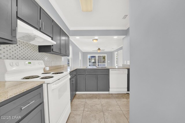 kitchen featuring crown molding, sink, white appliances, and gray cabinets