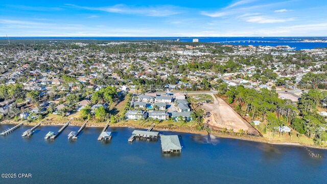 drone / aerial view with a water view