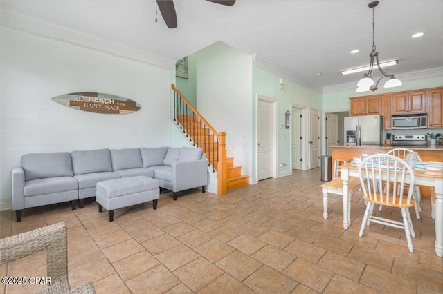 living area with stairway, ornamental molding, recessed lighting, and ceiling fan