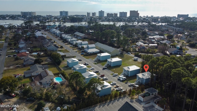 drone / aerial view with a water view