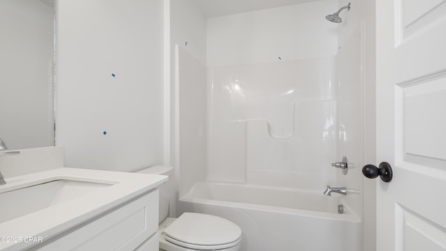 full bathroom featuring vanity, bathing tub / shower combination, and toilet