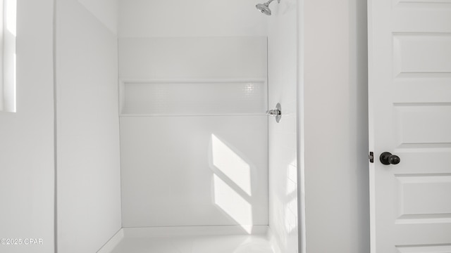 interior space featuring walk in shower