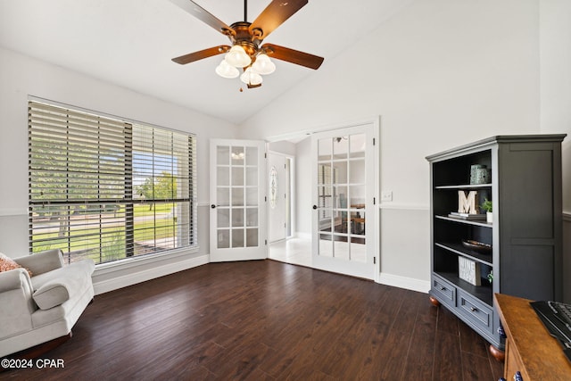 unfurnished room with ceiling fan, vaulted ceiling, dark hardwood / wood-style flooring, and french doors