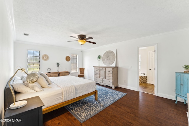 bedroom with ceiling fan, crown molding, dark wood-type flooring, and a textured ceiling