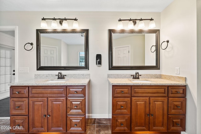 bathroom featuring vanity and tile patterned flooring