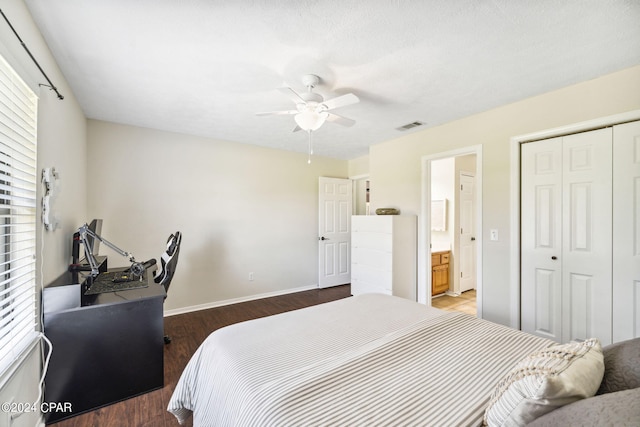 bedroom featuring dark wood-type flooring, ceiling fan, and a closet