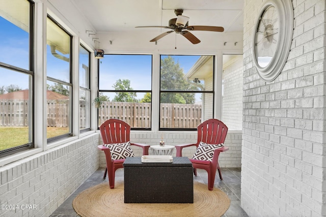 sunroom / solarium with ceiling fan