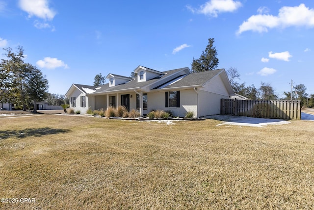 view of front of property with a front lawn