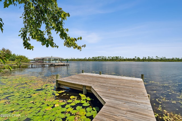 view of dock with a water view