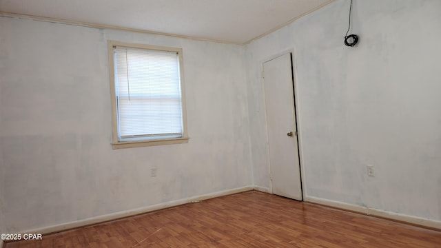 empty room featuring hardwood / wood-style flooring