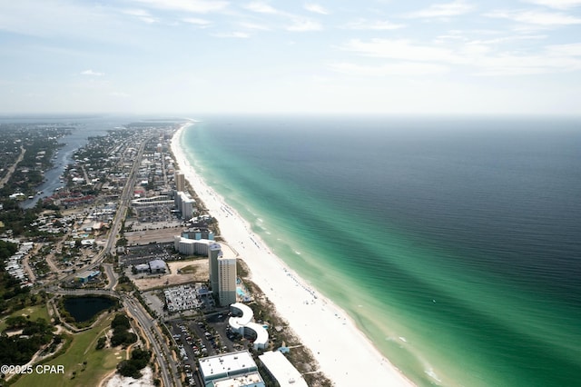 bird's eye view with a water view and a view of the beach